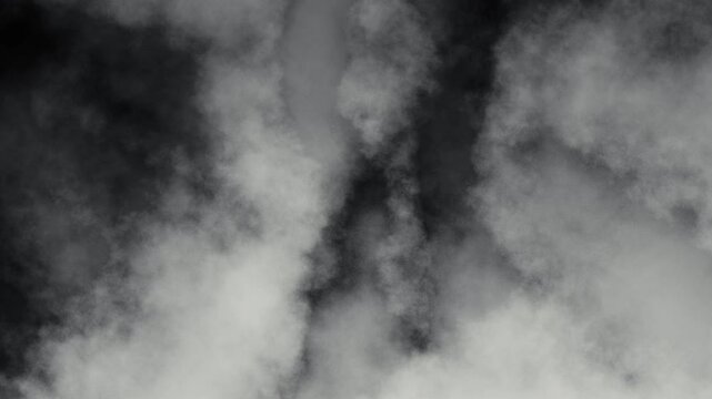 Seamless looping spooky high contrast black and white grainy smoke clouds overlay.