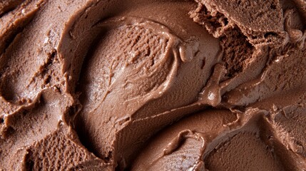 Close-up of melting chocolate ice cream scoop on chocolate ice cream background