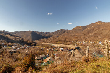 Autumn view of the mountainous area of the Caucasus. Autumn forest on the mountain hills of the...