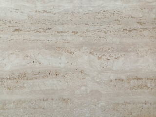 Bright cream travertine texture with fine lines.

