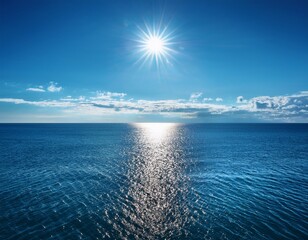 Fototapeta premium a sunny day features a large body of water with ripples and a sun centered above its surface