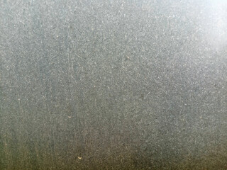 Gray granite texture with coarse striped patterns.

