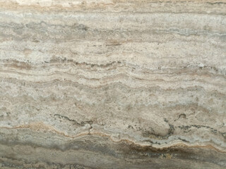 Cream travertine texture with distinctive horizontal vein patterns.

