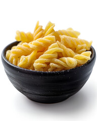 Uncooked pasta in a black bowl ready for cooking