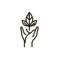 Hand holding a green leaf symbolizing care for nature and environmental sustainability