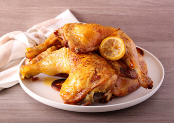 Roast lemon chicken legs served