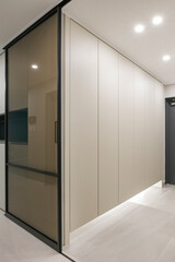 The most common interior design is to install indirect lighting under the shoe cabinet