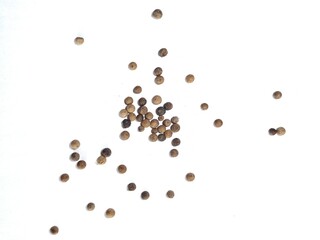 White pepper and black pepper isolated on white background with clipping path. Top view.