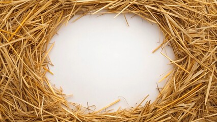 Close-up view of a textured straw wreath or ring, offering a warm and inviting natural frame against a bright white background. Excellent for showcasing text or images related to farming