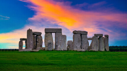 Landscapes image of sunset over Stonehenge an ancient prehistoric stone monument, Wiltshire, UK.