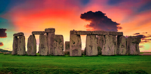 Landscapes image of sunset over Stonehenge an ancient prehistoric stone monument, Wiltshire, UK.
