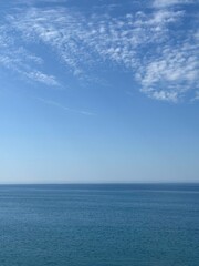 Obraz premium Tranquil blue sea and sky.