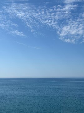 Tranquil blue sea and sky.