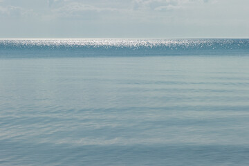 Lake Michigan, in early July, a calm surface off Harrington Beach State Park, Belgium, Wisconsin