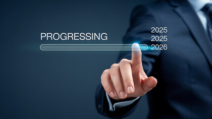This image depicts a businessman using a futuristic interface to progress towards his goals, showcasing a loading bar indicating advancement into 2026.