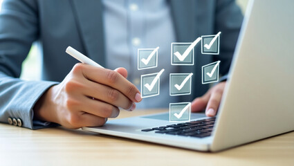 Hands in a suit write on a laptop, with checked boxes floating, representing task completion.