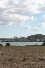 Taşaul Lake Aggregate quarry, Navodari. That produces construction of roads, platforms, railway embankments, as well as concrete and asphalt concrete mixtures.