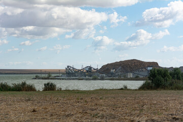 Taşaul Lake Aggregate quarry, Navodari. That produces construction of roads, platforms, railway embankments, as well as concrete and asphalt concrete mixtures.