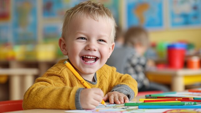 Joyful young child drawing with colorful pencils, radiating happiness and creativity in a bright classroom. Early learning at its finest.