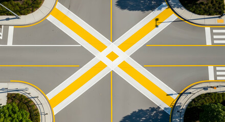 Aerial view of a modern crosswalk design with bright yellow pedestrian lane lines