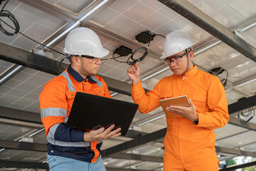Solar Technician at Work,Inspecting Solar Panels,Checking Circuit Flow,Ensuring Renewable Energy...