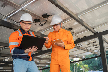 Solar Technician at Work,Inspecting Solar Panels,Checking Circuit Flow,Ensuring Renewable Energy...