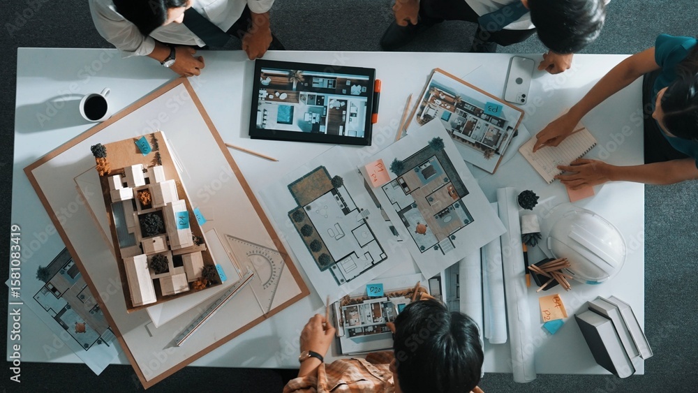 Poster top view of skilled architect engineer working together and shaking hand cooperative team while maki