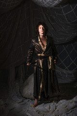 Modern prince costume combining suit silhouette with Middle Eastern decorative motifs