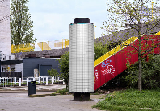 Mockup Of Round Vertical Customized Poster Tower In City