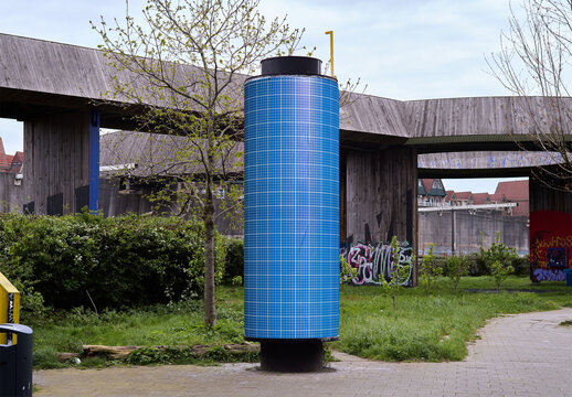 Mockup Of Round Vertical Customizable Poster Tower In City