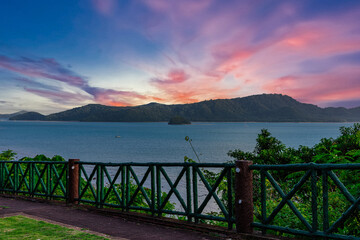 Beautiful view from Kao Khad next to Cape Panwa on the island of Phuket Thailand. Views of the turquoise Blue waters of the Andaman Sea and small islands off the coat of Phuket