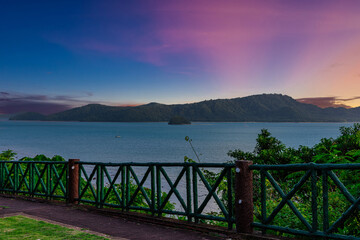 Beautiful view from Kao Khad next to Cape Panwa on the island of Phuket Thailand. Views of the turquoise Blue waters of the Andaman Sea and small islands off the coat of Phuket