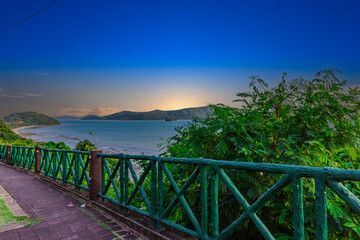 Obraz premium Beautiful view from Kao Khad next to Cape Panwa on the island of Phuket Thailand. Views of the turquoise Blue waters of the Andaman Sea and small islands off the coat of Phuket