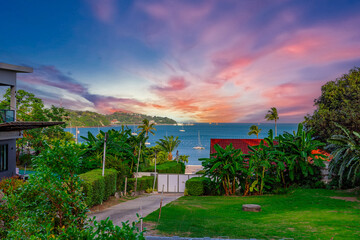 Beautiful view from Kao Khad next to Cape Panwa on the island of Phuket Thailand. Views of the turquoise Blue waters of the Andaman Sea and small islands off the coat of Phuket