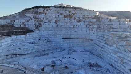 Marble quarry sunlight. white large blocks in the rays of sunset.High quality photo