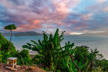 Beautiful view from Kao Khad next to Cape Panwa on the island of Phuket Thailand. Views of the turquoise Blue waters of the Andaman Sea and small islands off the coat of Phuket