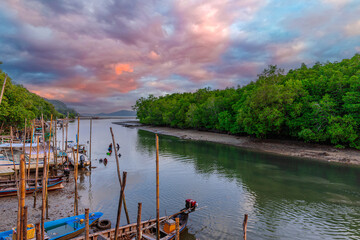 Obraz premium Beautiful view from Kao Khad next to Cape Panwa on the island of Phuket Thailand. Views of the turquoise Blue waters of the Andaman Sea and small islands off the coat of Phuket