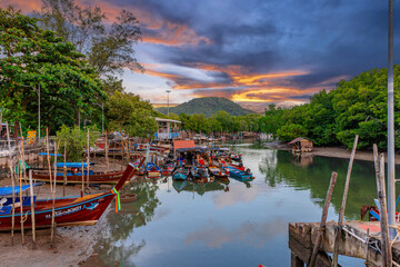 Fototapeta premium Beautiful view from Kao Khad next to Cape Panwa on the island of Phuket Thailand. Views of the turquoise Blue waters of the Andaman Sea and small islands off the coat of Phuket