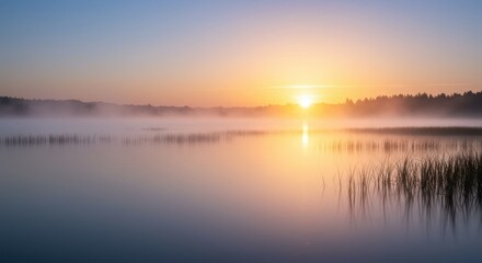 Fototapeta premium Misty Lake Sunrise with Warm Colors