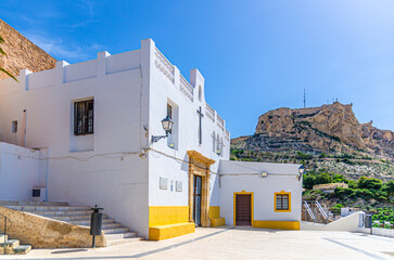Ermita de la Santa Creu church and Mount Benacantil rock in Alicante old town Barrio de Santa Cruz, Barri Vell Santa Creu Alacant, Santa Cruz quarter in Alicante city historic centre, Spain