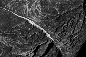 Naklejka premium a natural rock of shale ore in cracks