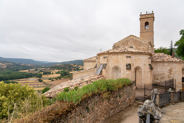 Fototapeta premium Stunning view of Brihuega's historic church overlooking the fertile fields of Guadalajara, Castilla-La Mancha, Spain