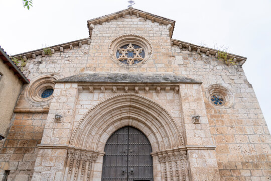 Explore the architectural beauty of Iglesia de San Miguel in Brihuega, Guadalajara, Castilla-La-Mancha, Spain during a cloudy day