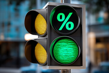 Traffic signal displaying green and yellow lights in an urban setting during daytime hours