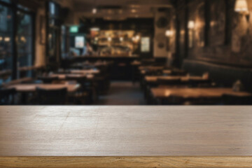 Blurred atmospheric bar with empty wooden table in the foreground, ideal for product display or mockup use. Nightlife, alcohol, leisure, entertainment or casual gatherings concept.