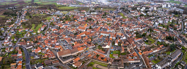 Aerial View Around The Old Town Of Molsheim on a late cloudy afternoon in spring
