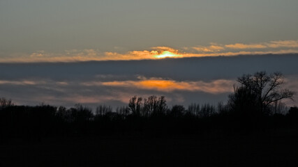 Colorful winter evening sky over the marsh