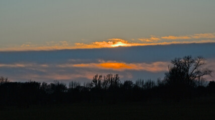 Colorful winter evening sky over the marsh