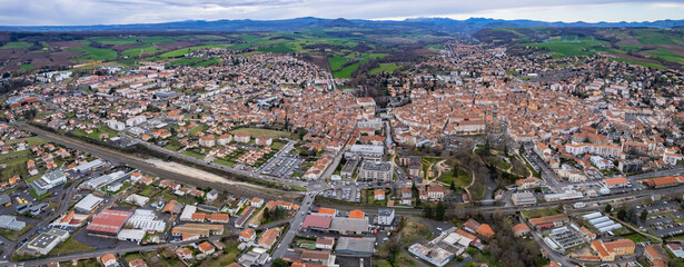 Aerial view of the old town of Issoire in France on a sunny afternoon in spring.