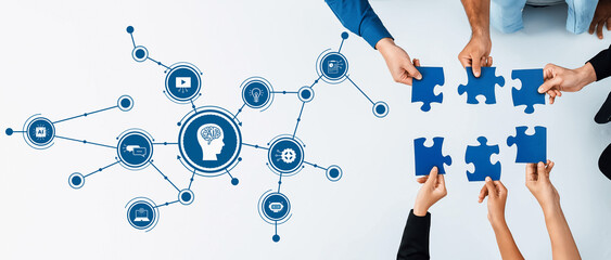 This image illustrates a collaborative AI concept featuring hands holding puzzle pieces alongside a...